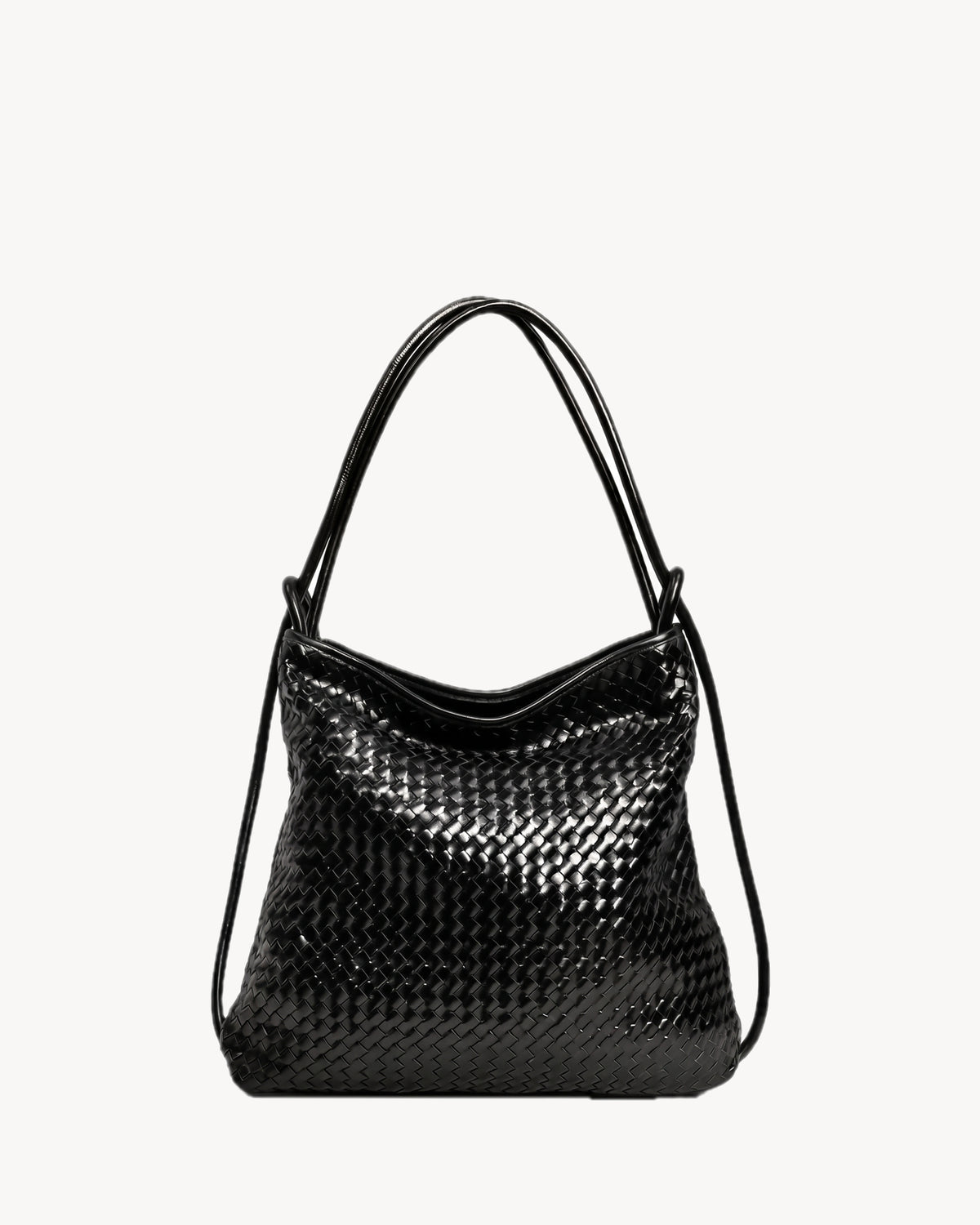 The Embellie Grand in Noir, glossy black woven leather convertible tote, front view