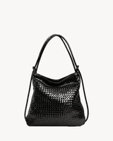 The Embellie Grand in Noir, glossy black woven leather convertible tote, front view