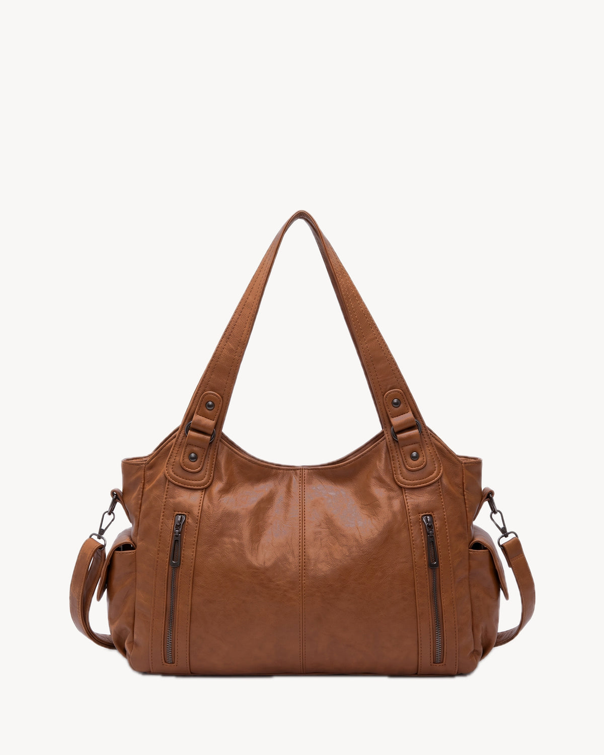 The Estran in Cognac, front view with detachable crossbody strap