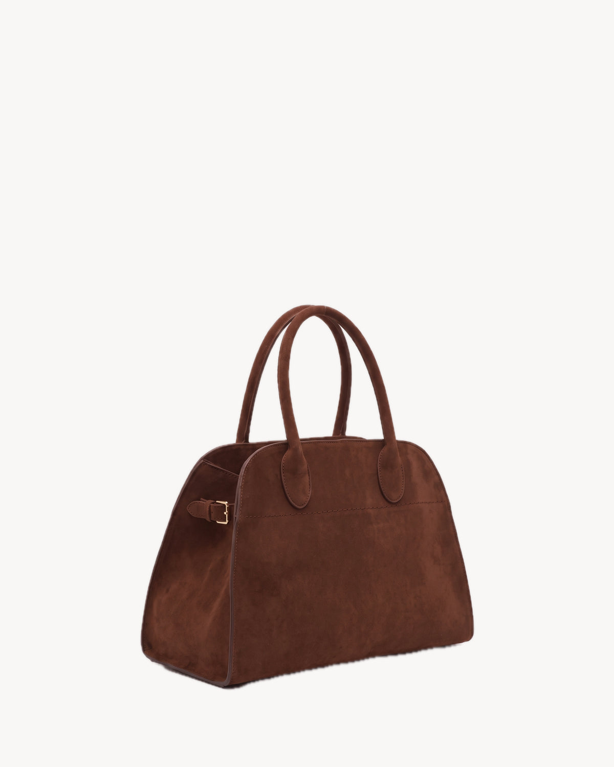 The Aurore Suede Satchel in Chocolate, three-quarter view with side buckle