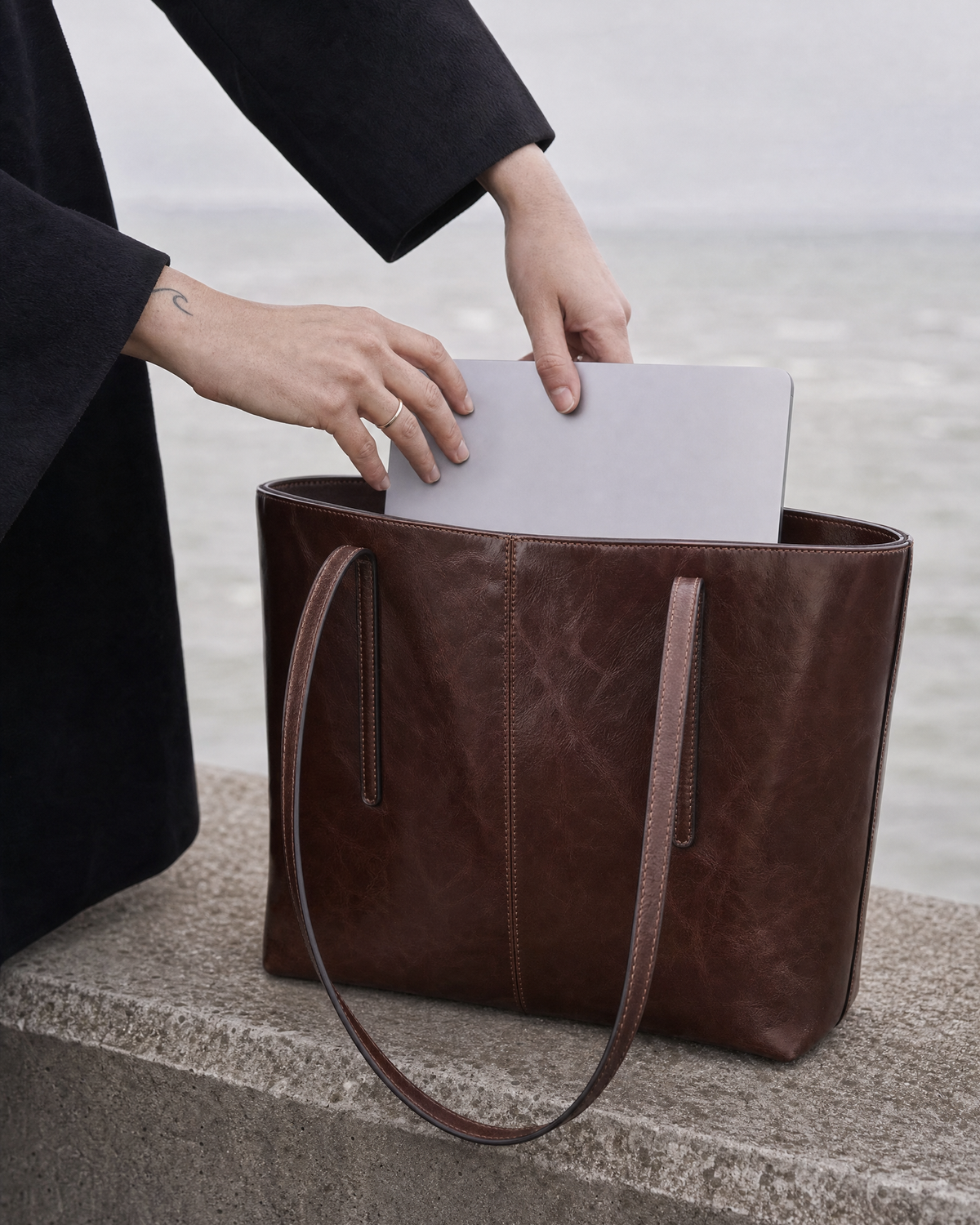 A laptop slipped into The Marée Grand in Espresso