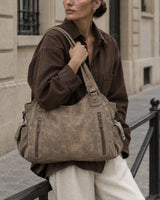 The Estran in Sable, carried by its two shoulder handles