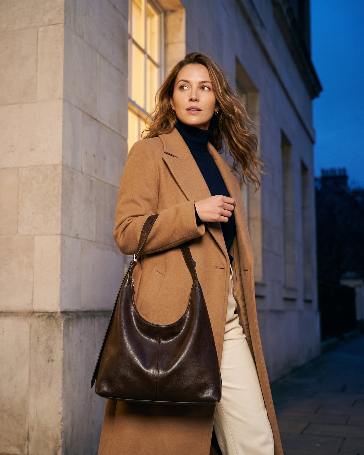 The Houle in Espresso, worn on the shoulder at blue hour