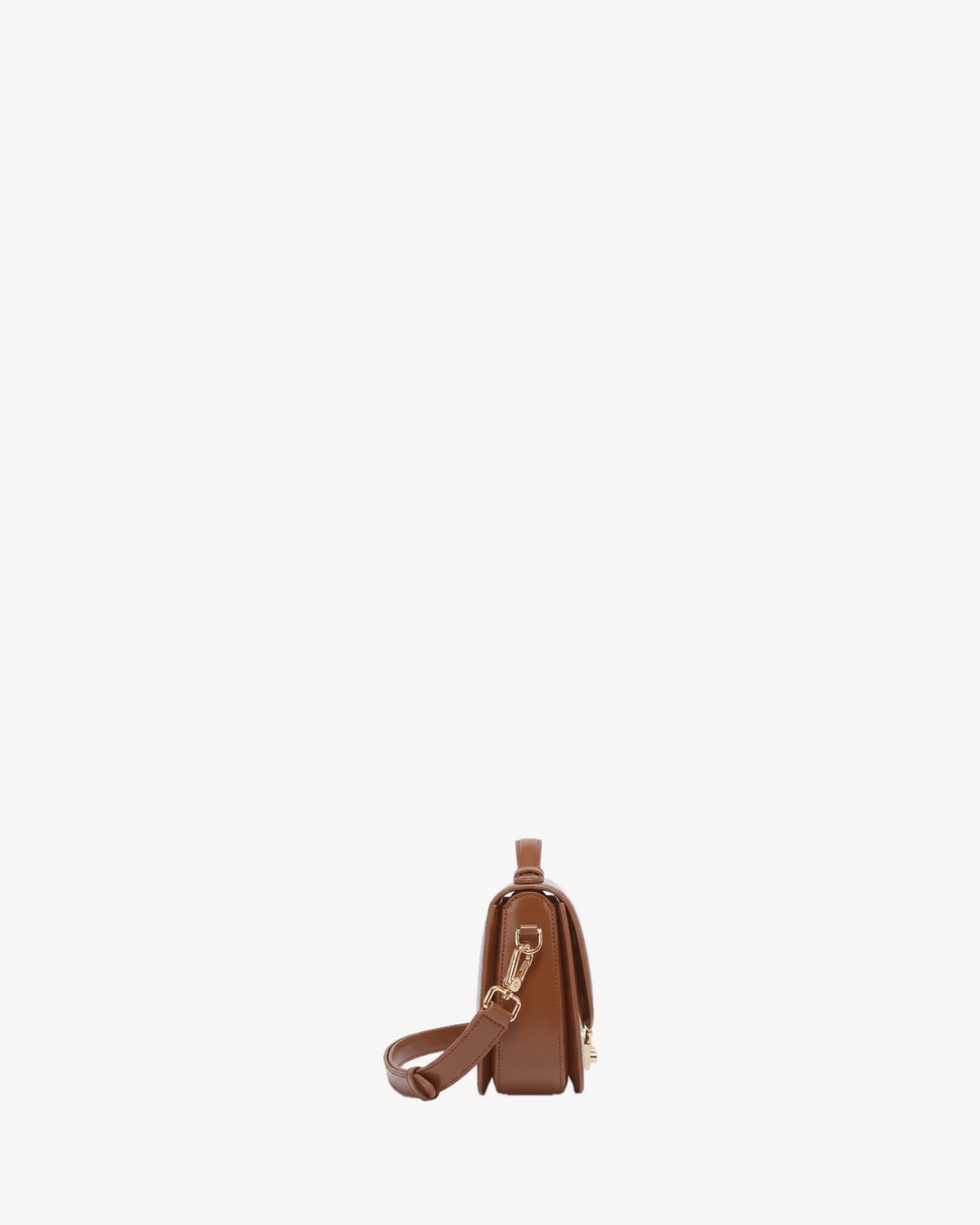 The Brise Saddle in Cognac, side view showing depth