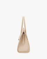 The Aurore Briefcase in Écru, side view showing depth