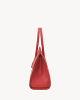 The Aurore Briefcase in Rouge, side view showing depth