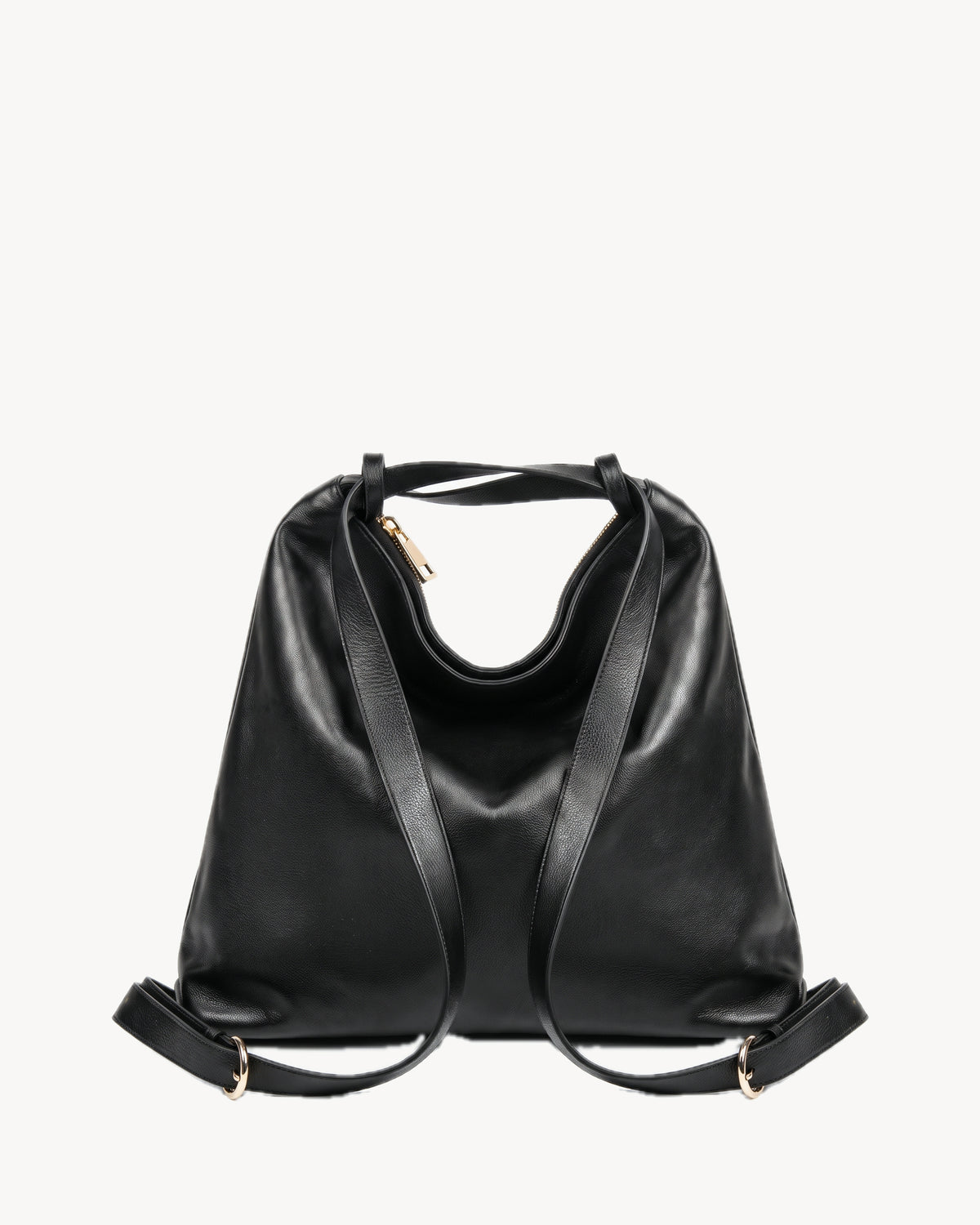 The Jusant Carryall in Noir, worn as a backpack, strap arrangement