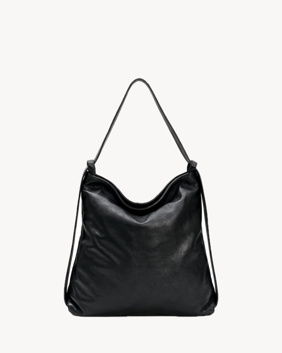 The Embellie Carryall in Noir, black pebbled leather convertible carryall tote, three-quarter view