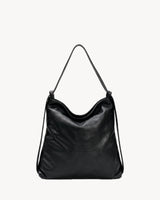 The Embellie Carryall in Noir, black pebbled leather convertible carryall tote, three-quarter view