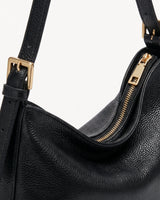 The Houle Petite in Noir, gold zip detail