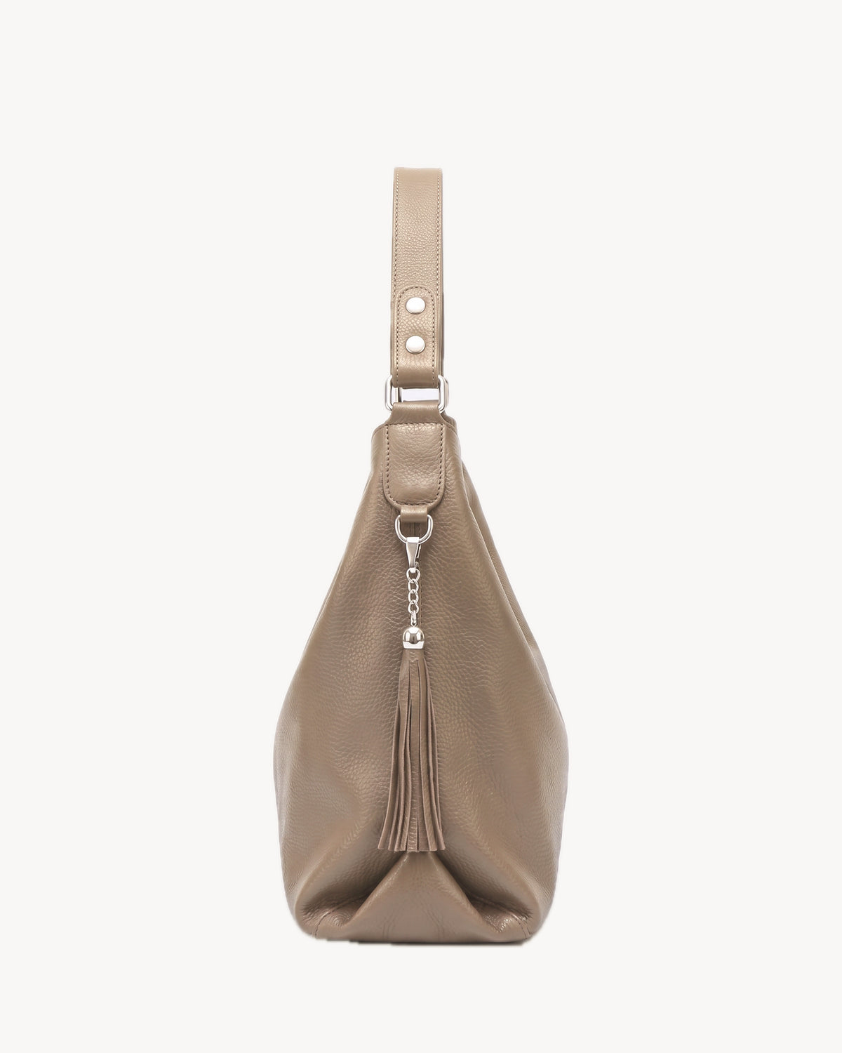 The Houle Soft in Taupe, taupe pebbled leather hobo bag, side view with leather tassel