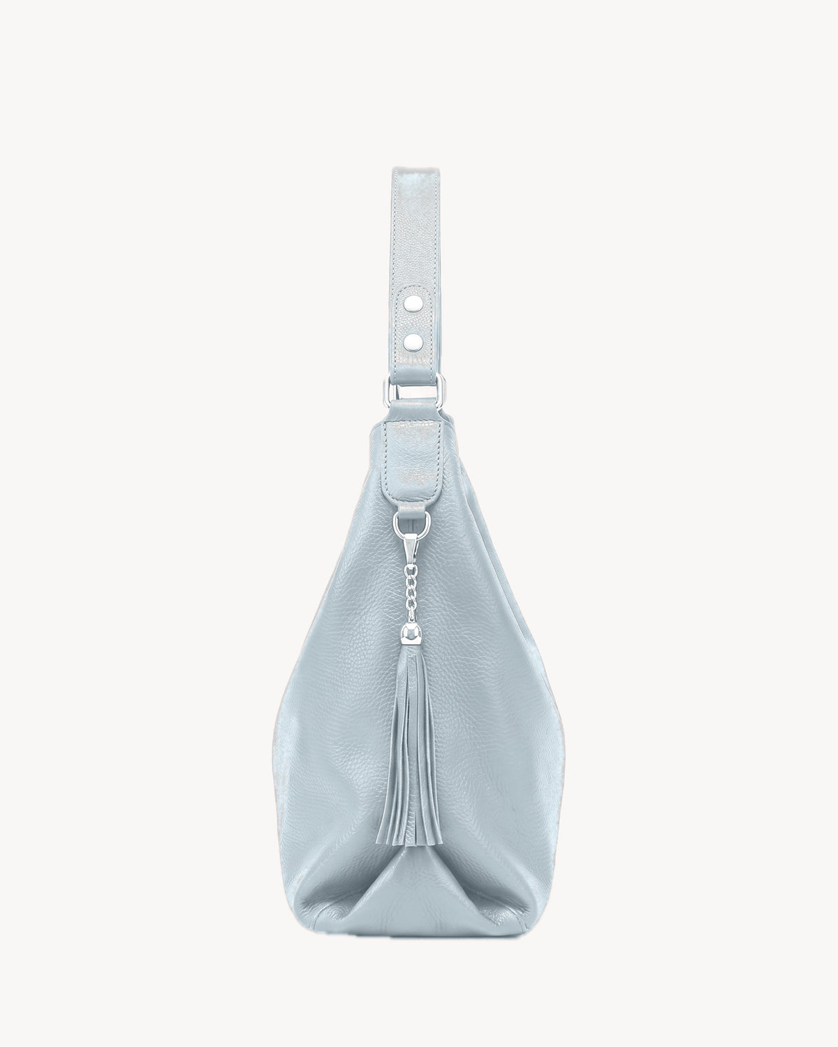 The Houle Soft in Ciel, powder sky blue grained leather hobo bag, side view with leather tassel