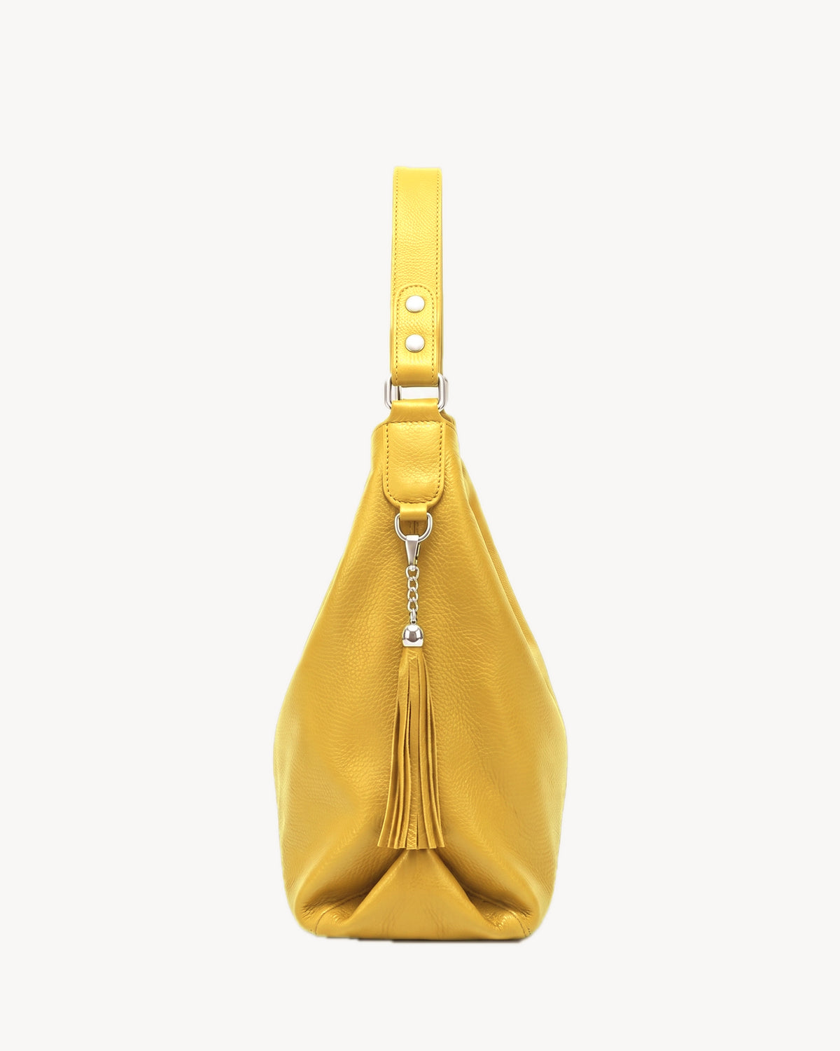 The Houle Soft in Citron, lemon yellow grained leather hobo bag, side view with leather tassel