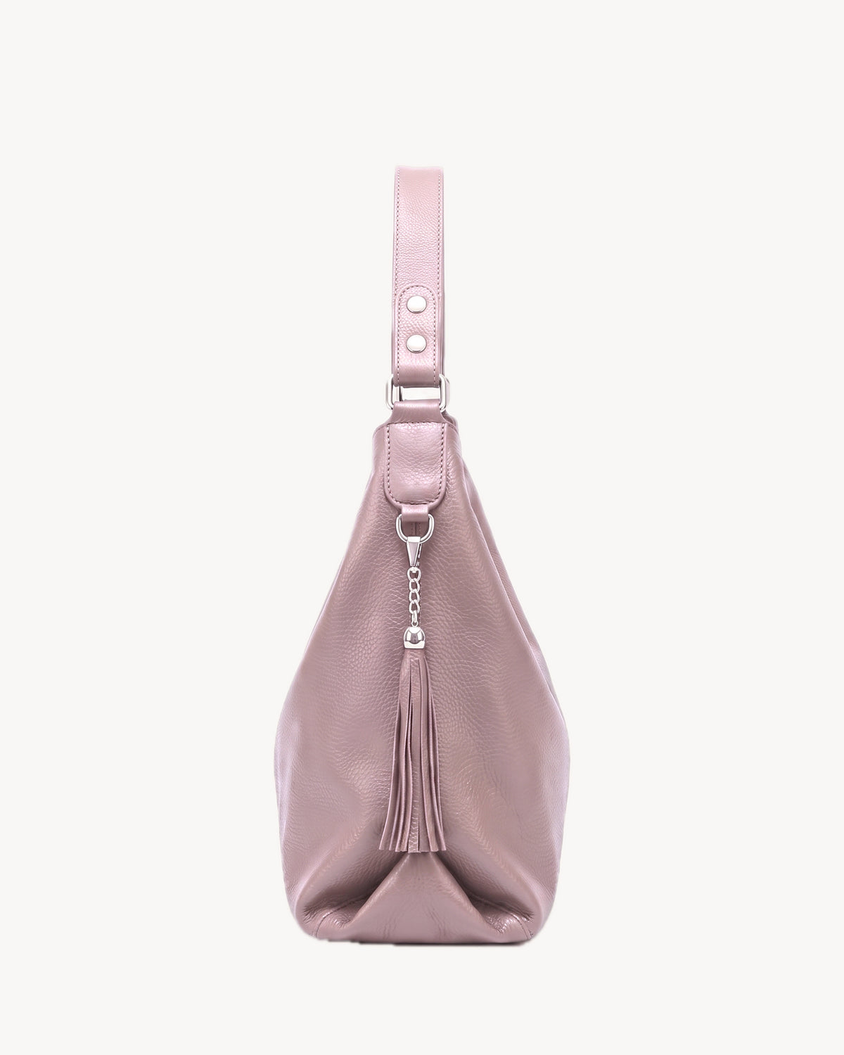The Houle Soft in Rose, dusty rose grained leather hobo bag, side view with leather tassel