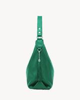 The Houle Soft in Forêt, emerald green pebbled leather hobo bag, side view with leather tassel