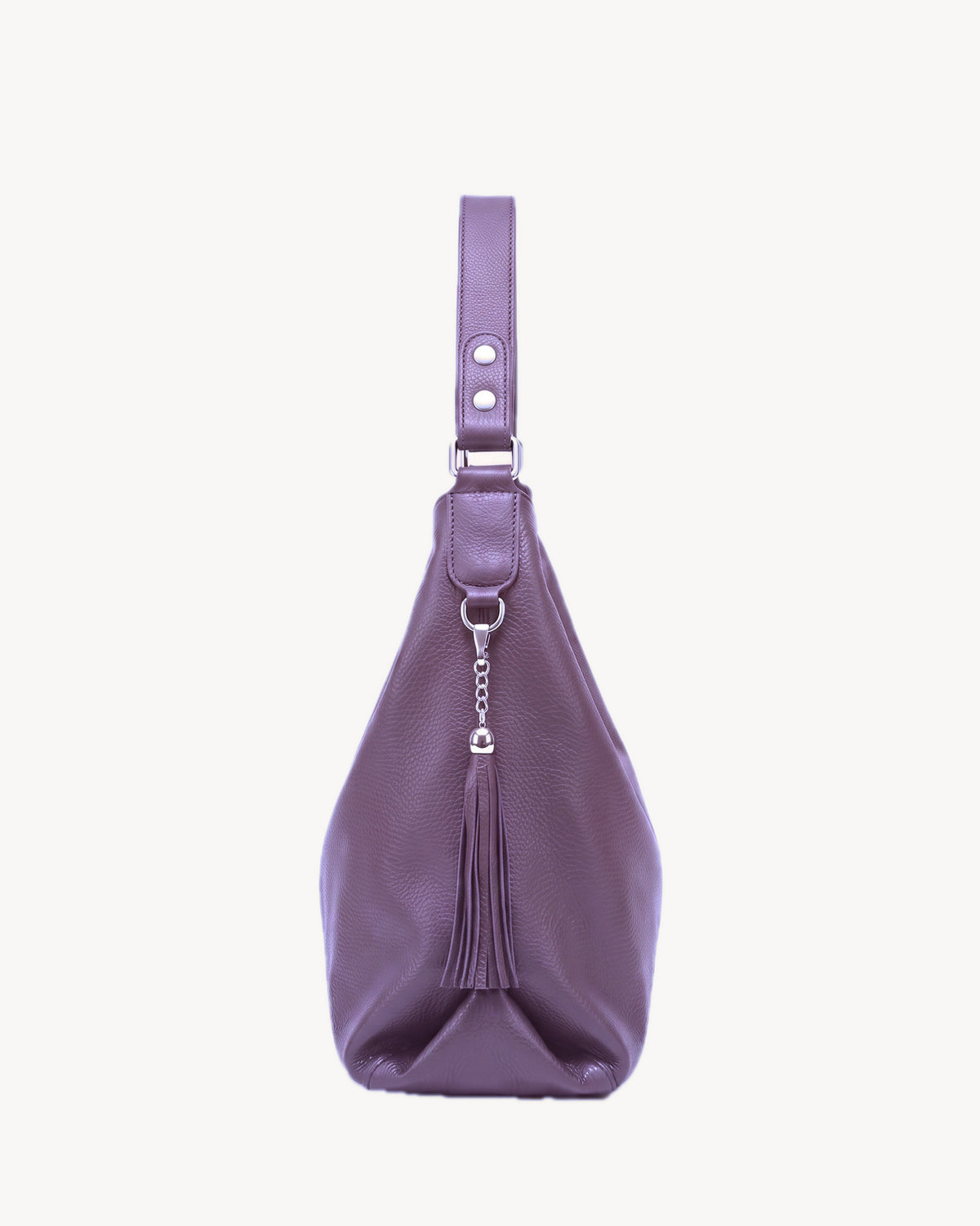 The Houle Soft in Lilas, muted lilac grained leather hobo bag, side view with leather tassel