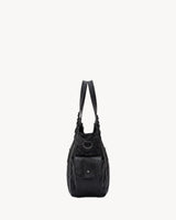The Estran in Noir, side view with snap pocket
