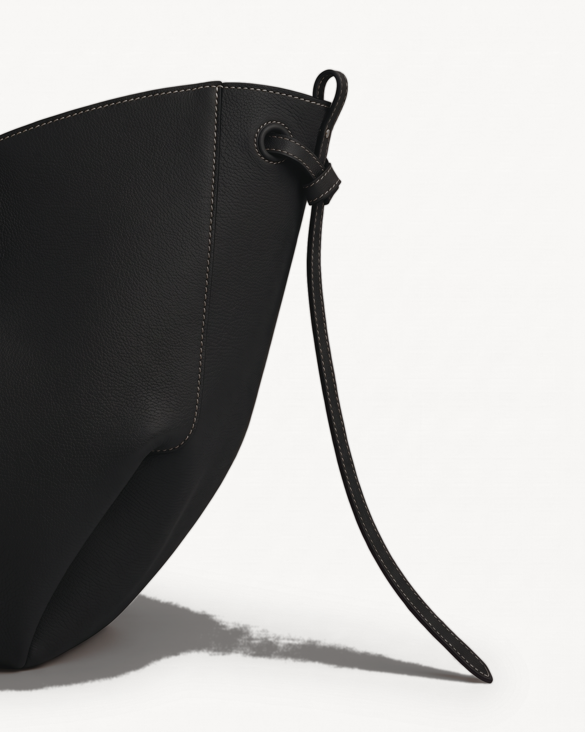Close-up of the side tie of The Havre Wing in Noir