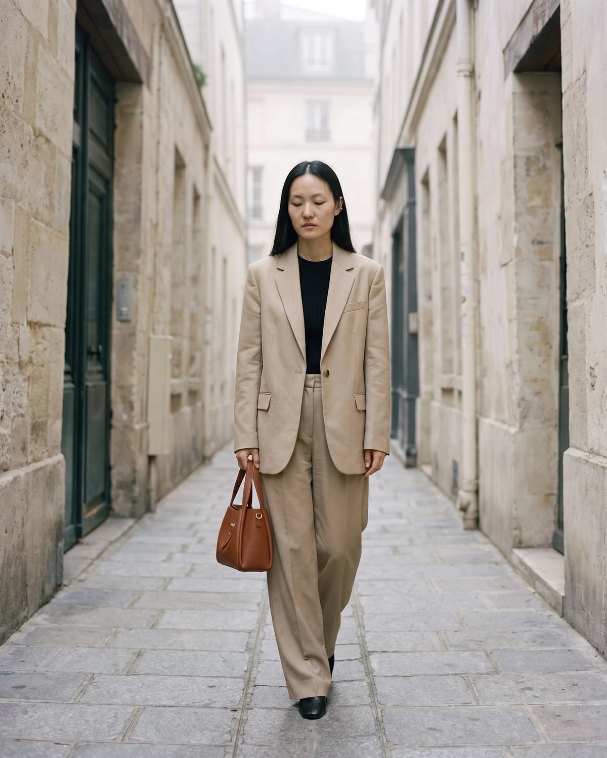 The Grève in Cognac carried by hand on a cobbled street