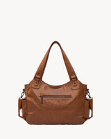 The Estran in Cognac, back view with zip pocket