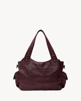 The Estran in Bordeaux, back view with zip pocket