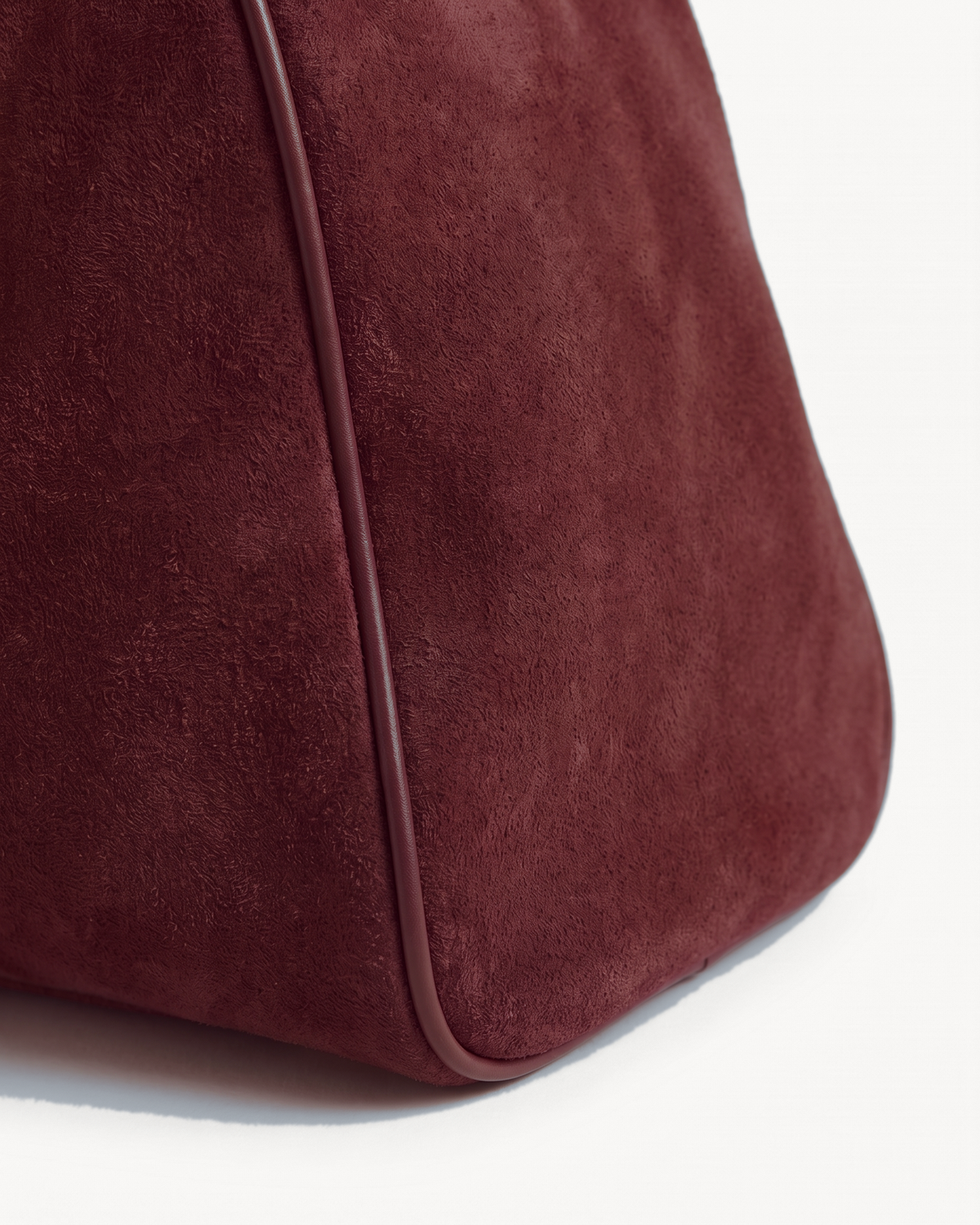 Close-up of the piped suede end of The Brume East-West in Bordeaux