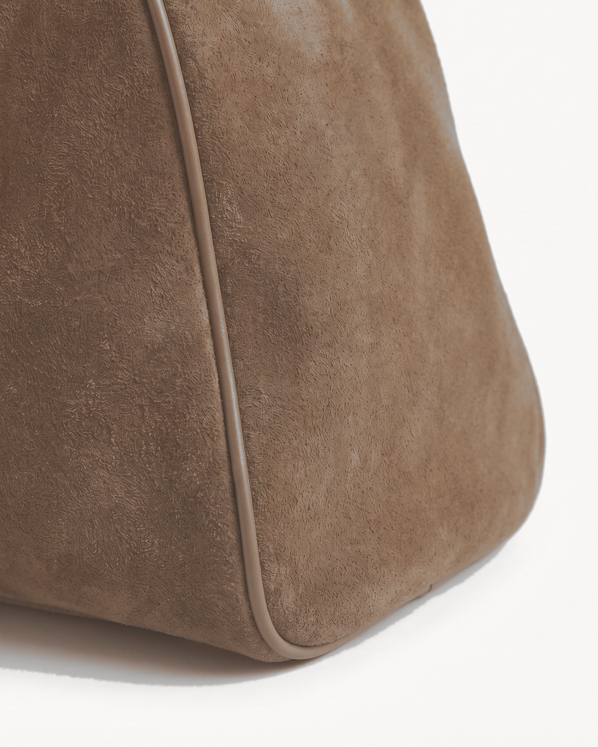 Close-up of the piped suede end of The Brume East-West in Galet