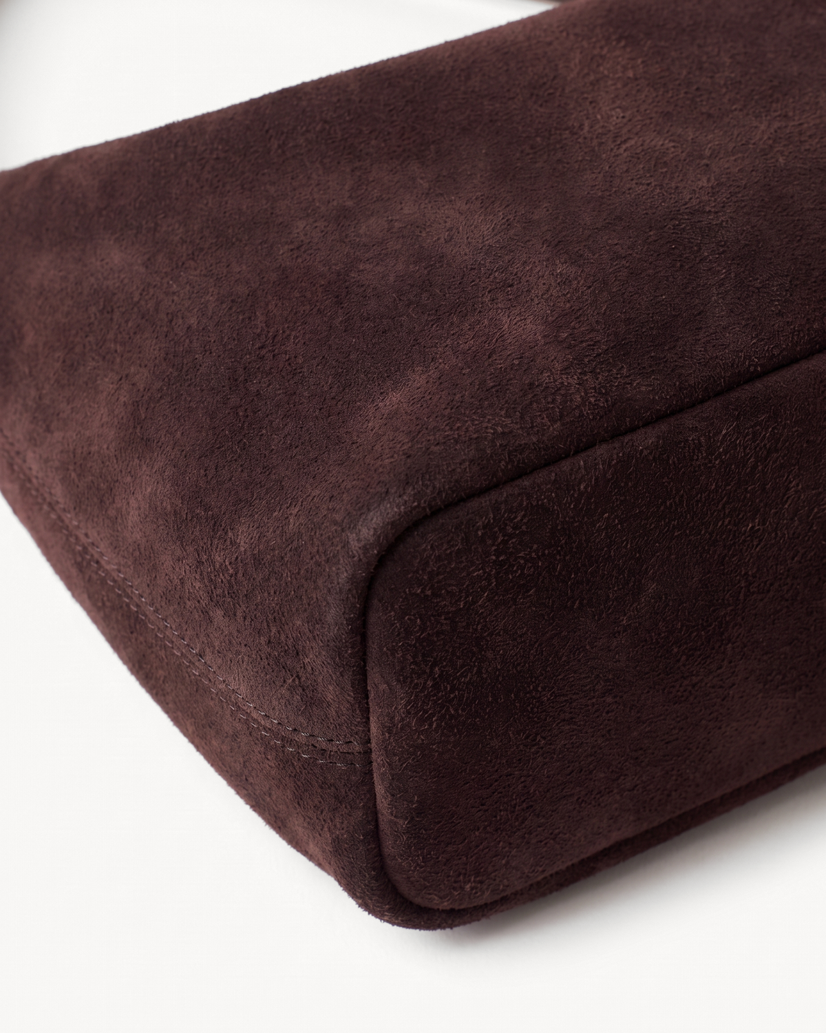 Close-up of the chocolate suede of The Brume Petite