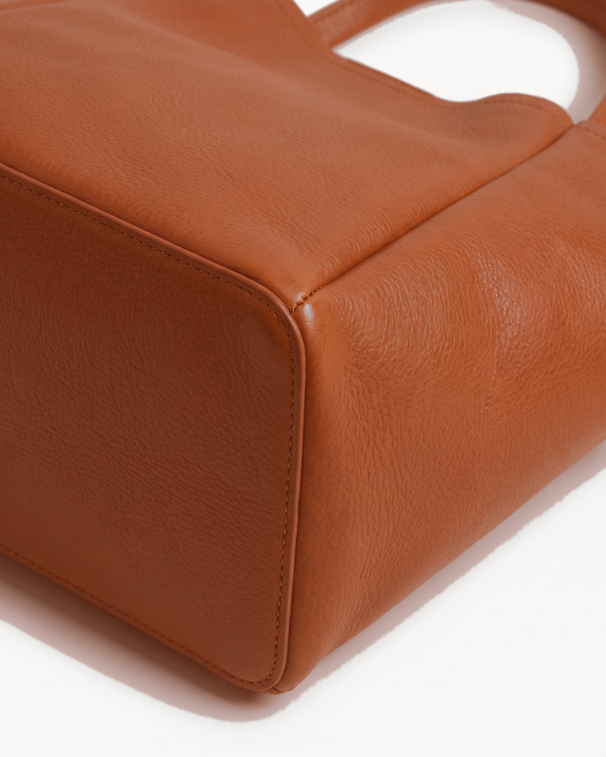 Close-up of the leather and base corner of The Havre Day in Cognac