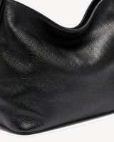 The Houle Petite in Noir, pebbled leather detail
