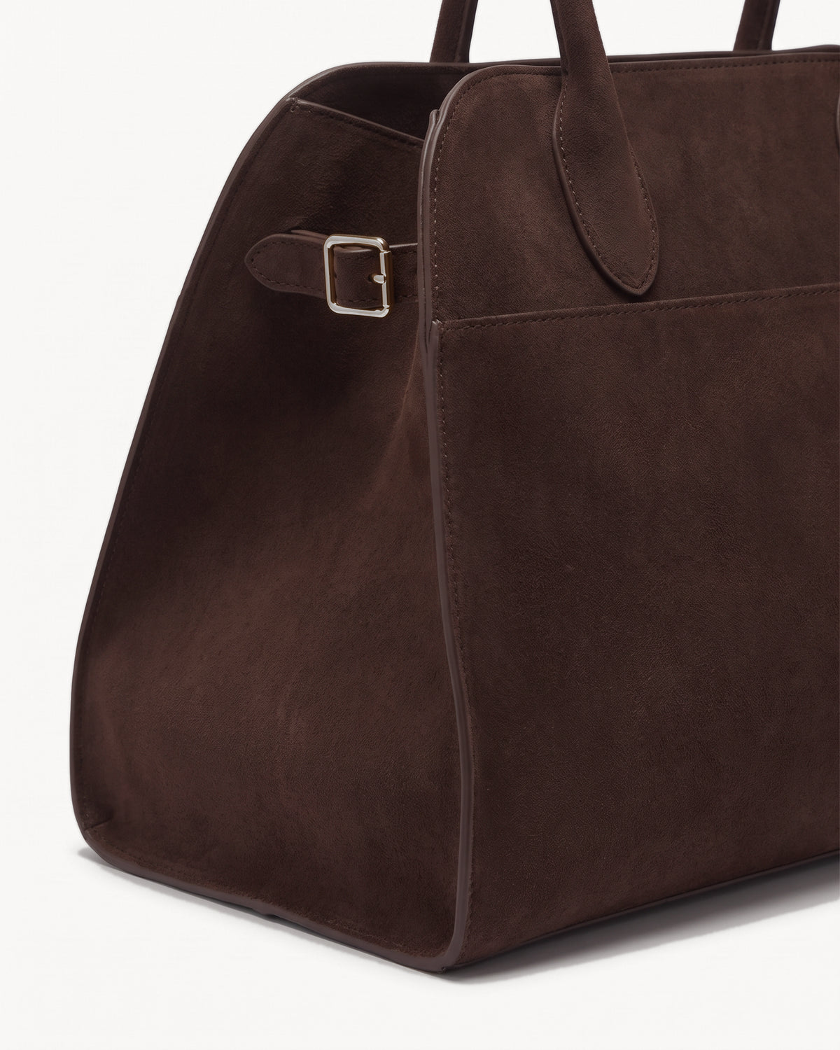 The Aurore Suede Satchel in Espresso, side strap with gold-tone buckle