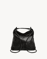 The Embellie Grand in Noir, worn as a backpack: the cords pulled through the loops as shoulder straps