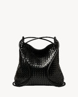The Embellie in Noir, worn as a backpack: the cords pulled through the loops as shoulder straps