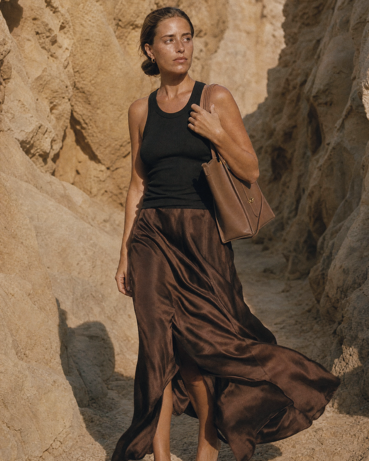 Woman in the wind with The Havre Buckle in Espresso