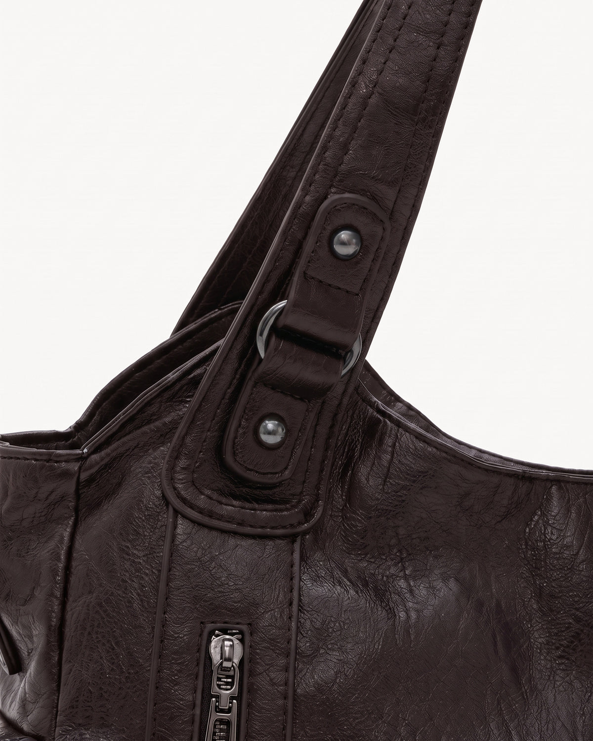 The Estran in Espresso, handle with riveted tab and gunmetal ring
