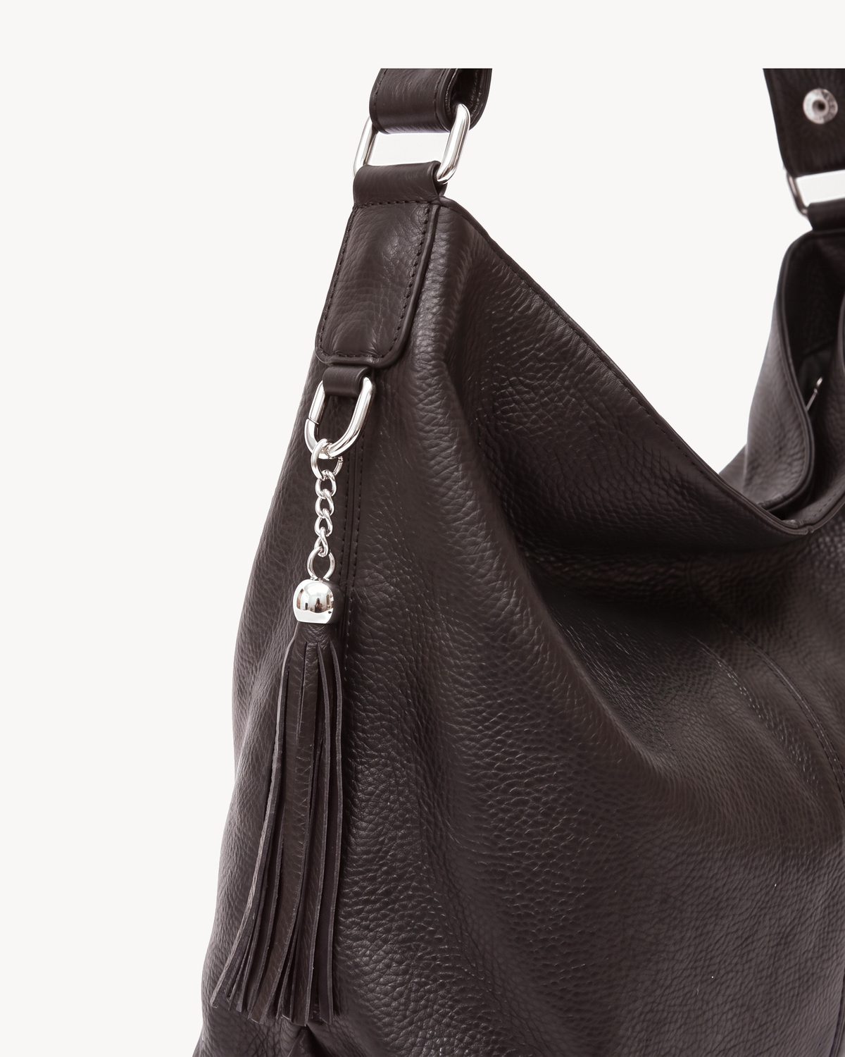 The Houle Soft in Espresso, close-up of the leather tassel on its silver chain