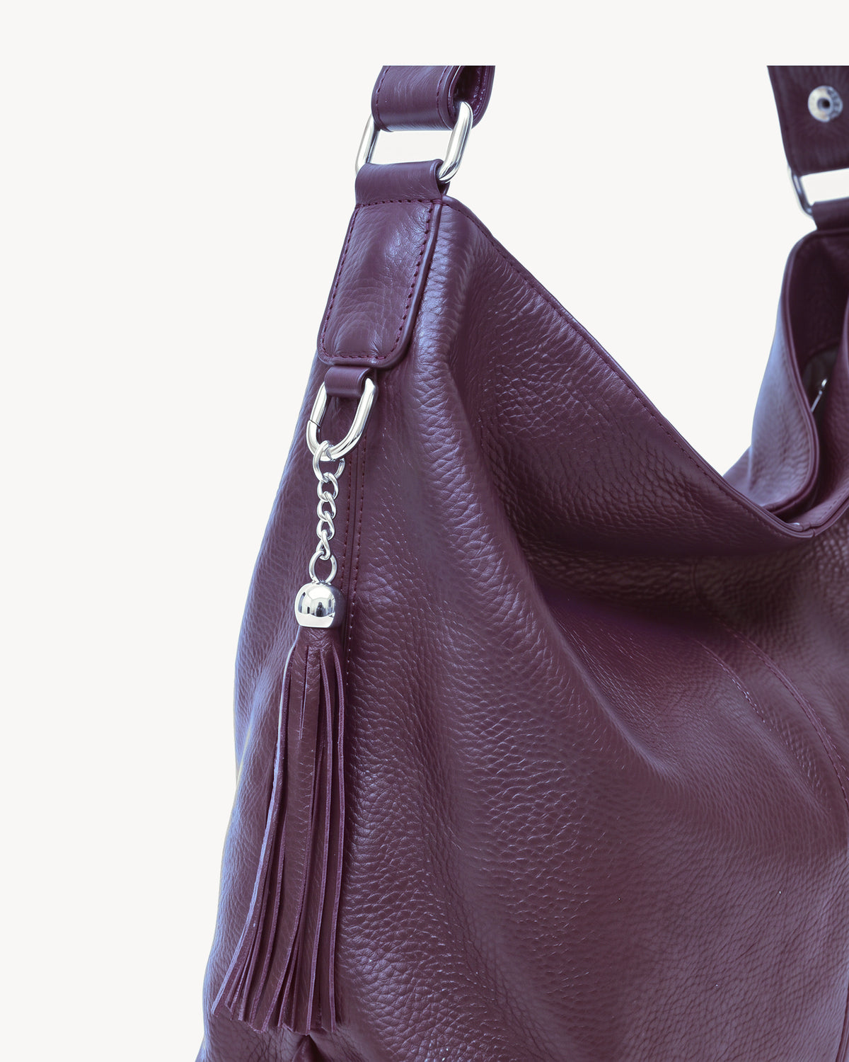 The Houle Soft in Prune, close-up of the leather tassel on its silver chain