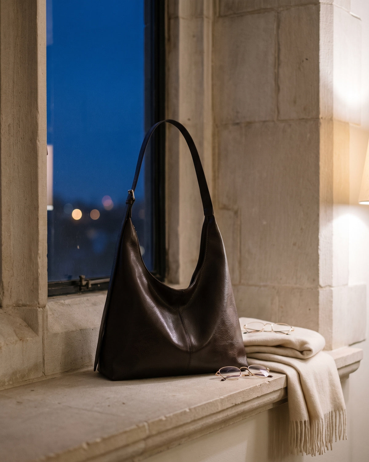 The Houle in Espresso on a stone window ledge