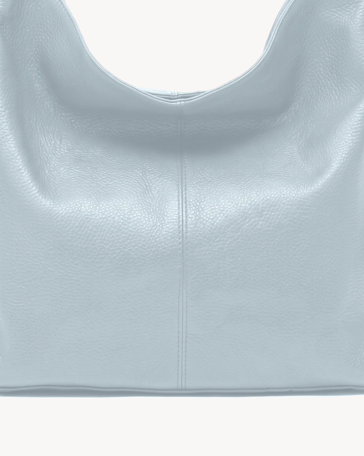 The Houle Soft in Ciel, close-up of the pebbled powder sky blue leather and centre seam