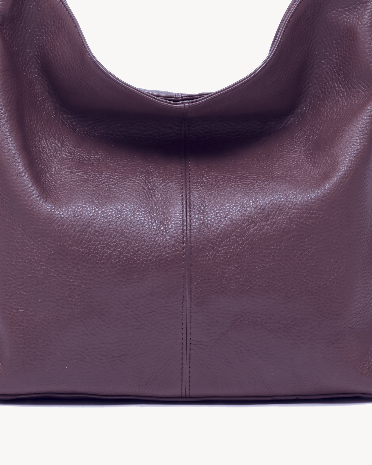 The Houle Soft in Prune, close-up of the pebbled plum leather and centre seam