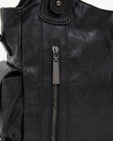 The Estran in Noir, front zip pocket detail