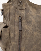 The Estran in Sable, front zip pocket detail