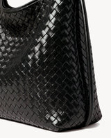 The Embellie Grand in Noir, close-up of the hand-woven leather