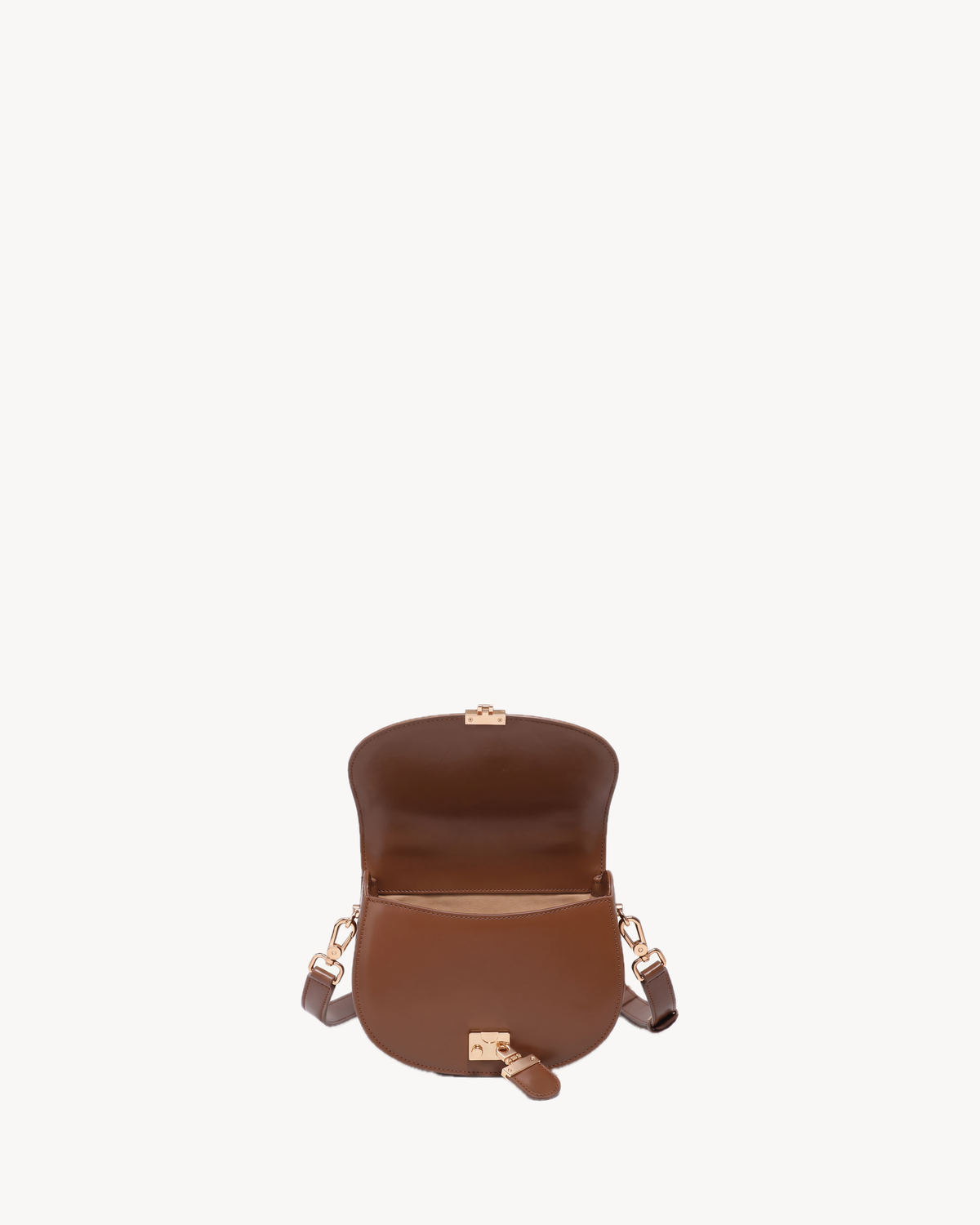 The Brise Saddle in Cognac with the flap open