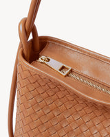 The Embellie Mini in Cognac, close-up of the top zip closure