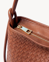 The Embellie Grand in Caramel, close-up of the top zip closure