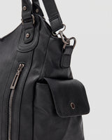 The Estran in Noir, side snap pocket and strap ring