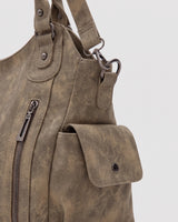 The Estran in Sable, side snap pocket and strap ring
