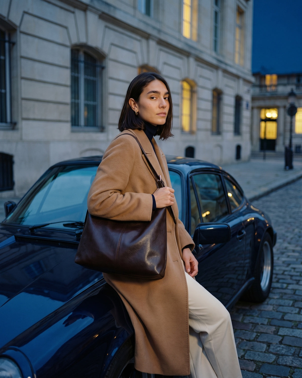 The Houle in Espresso, worn with a camel coat at dusk