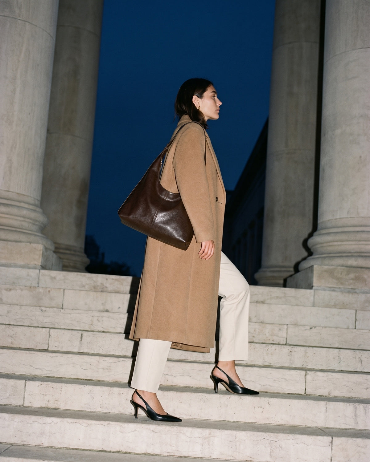 The Houle in Espresso, worn on stone steps